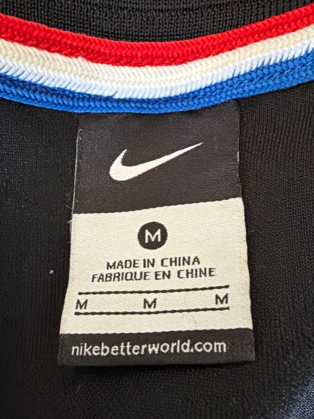 Nike Black Track Jacket with Red & Blue Sleeves